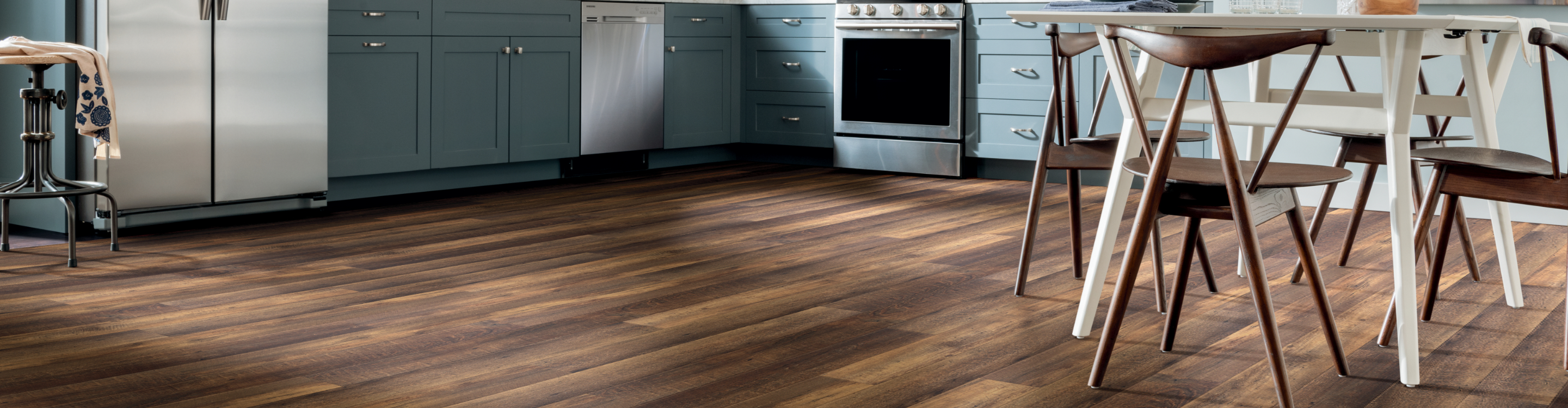 Dark wood look vinyl plank floor in casual kitchen 